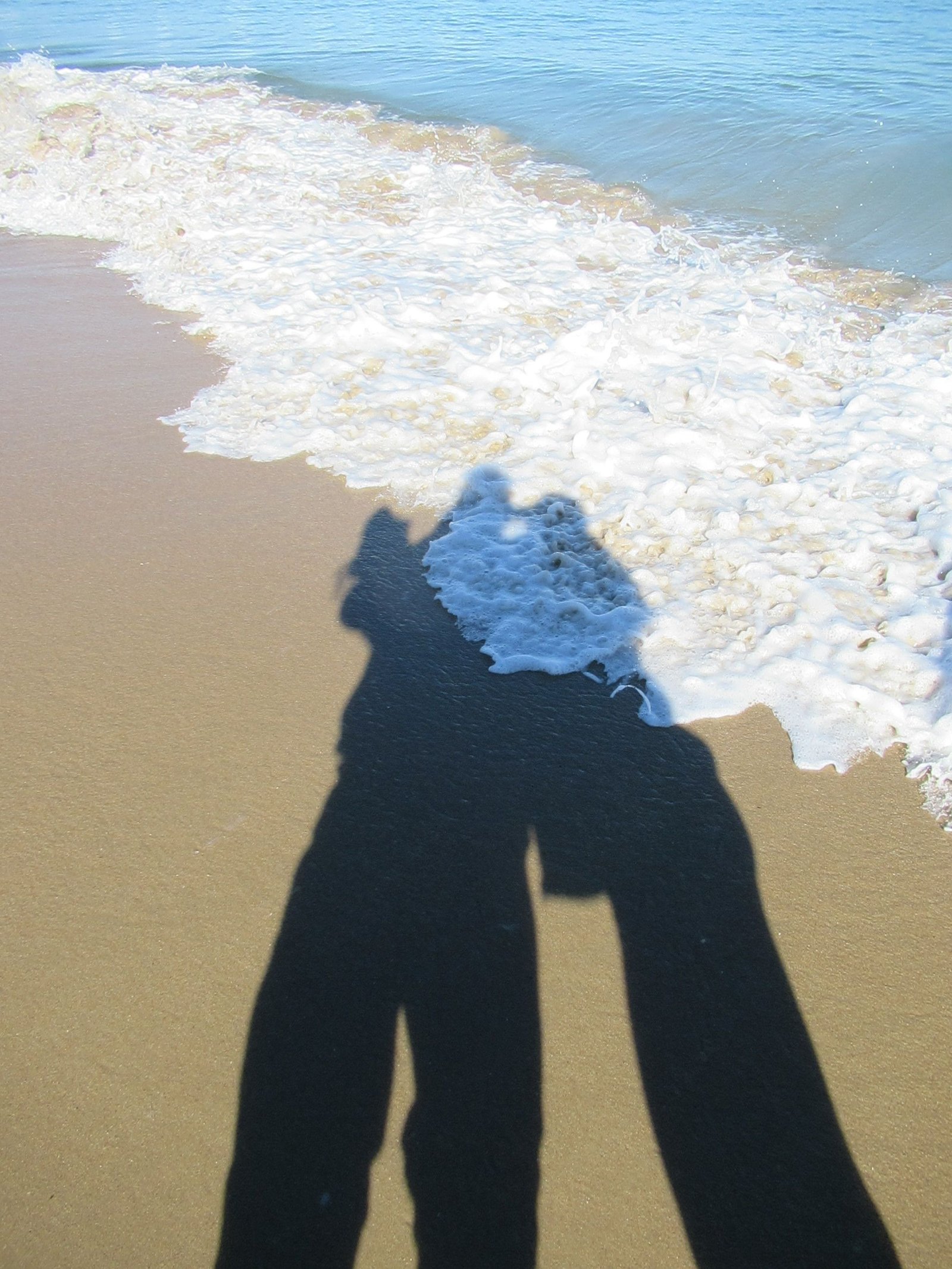 Ombre d'un couple à la plage
