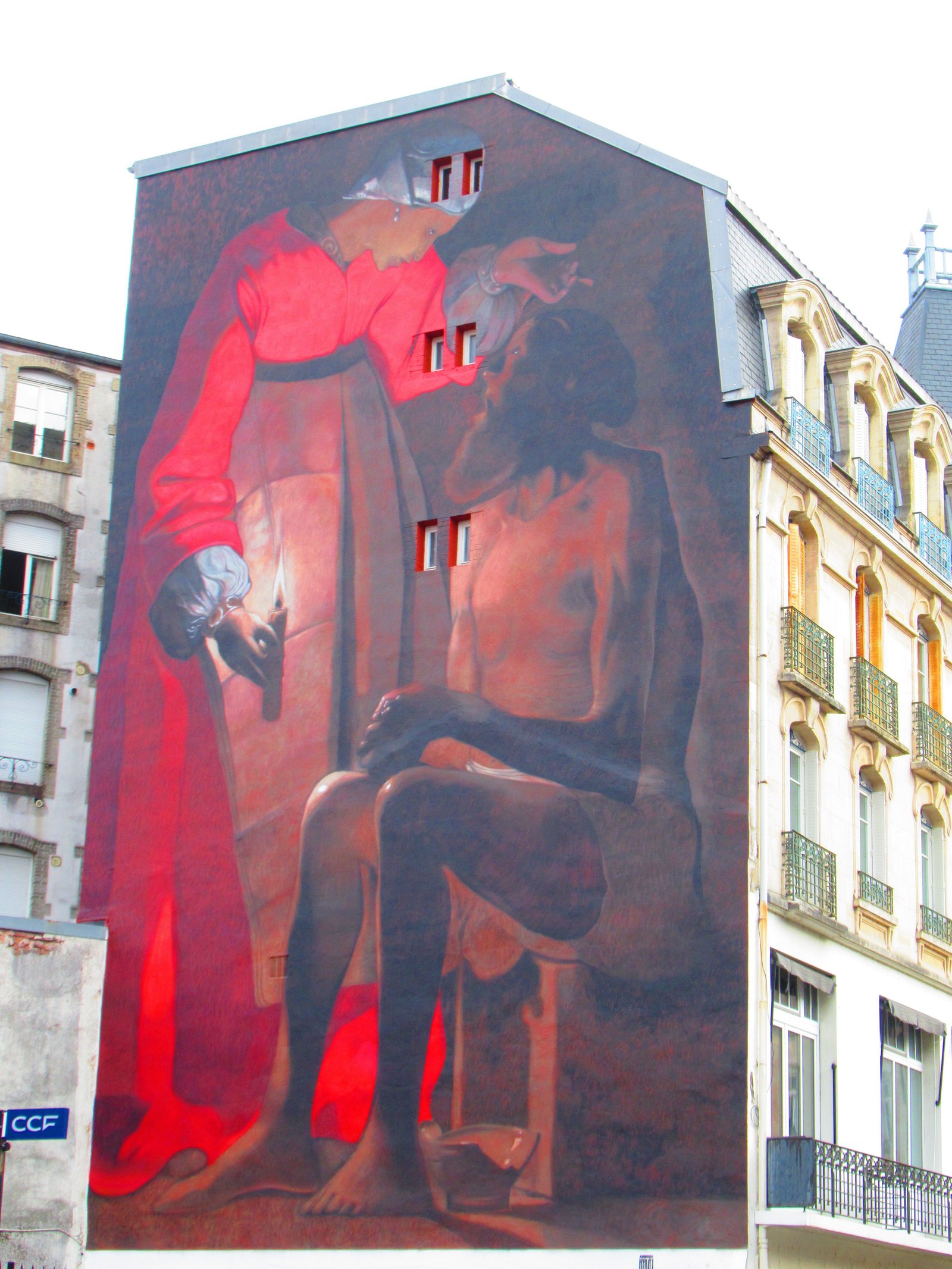 Fresque monumentale, tableau job raillé par sa femme, sur le mur à Épinal photo gratuite